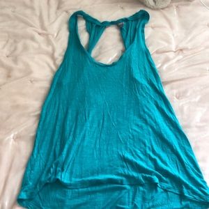 blue tank top with cut out hole in the back